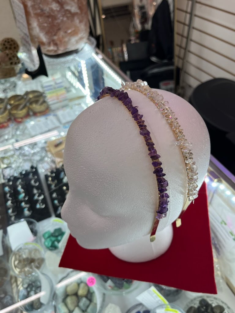 A white head with two different colored bracelets on it