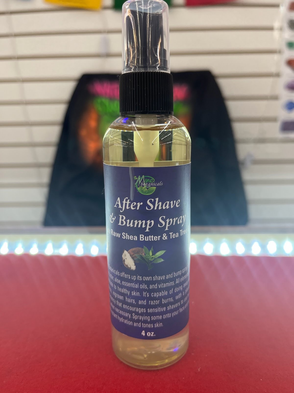 A bottle of after shave bump spray