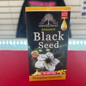 A package of black seed sitting on top of a table.