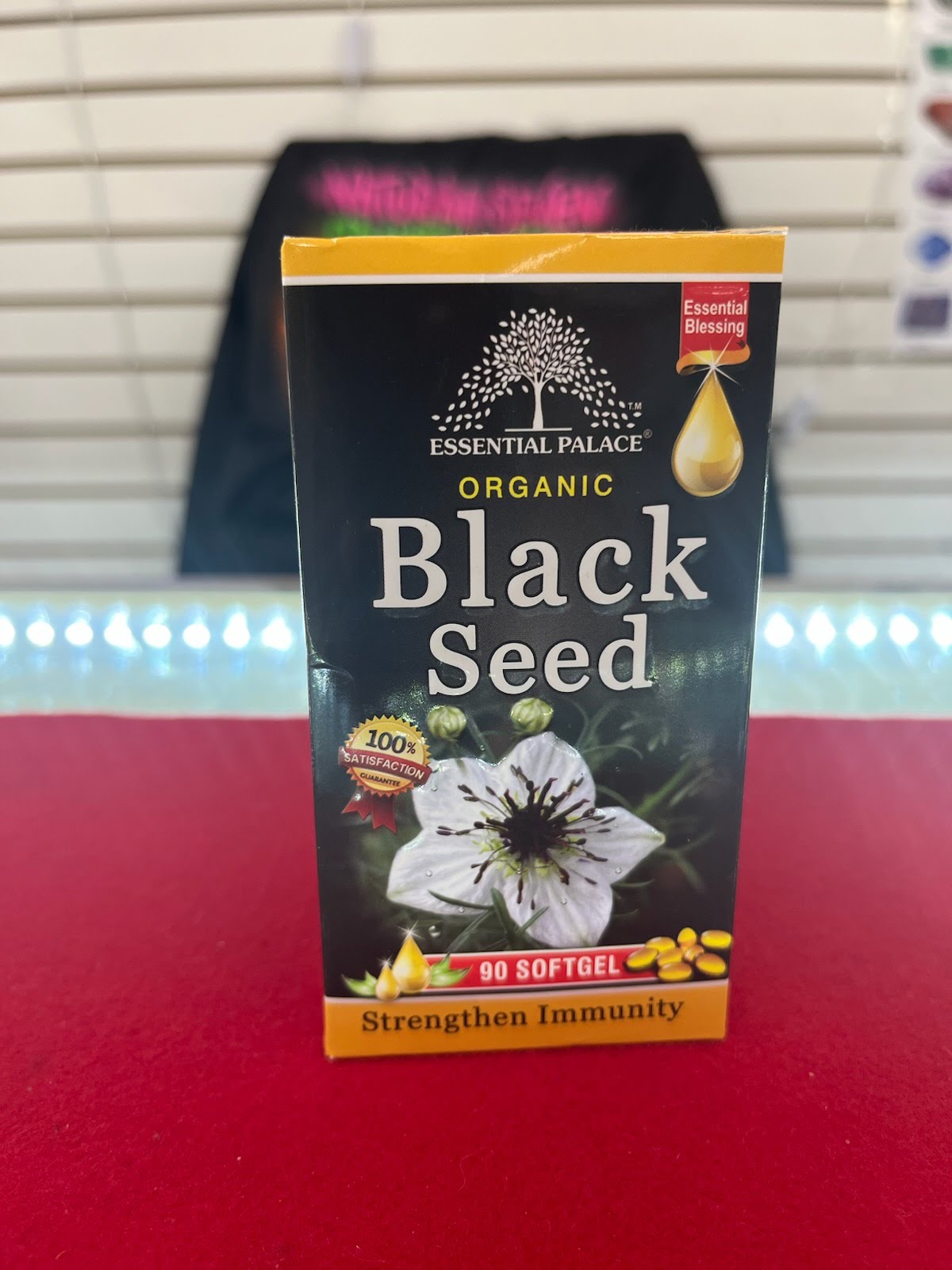 A package of black seed sitting on top of a table.
