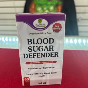 A box of blood sugar defender is sitting on the table.