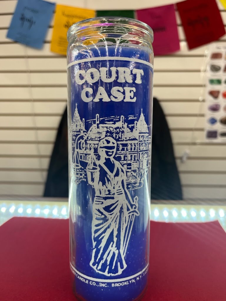 A glass with the image of statue of liberty on it.