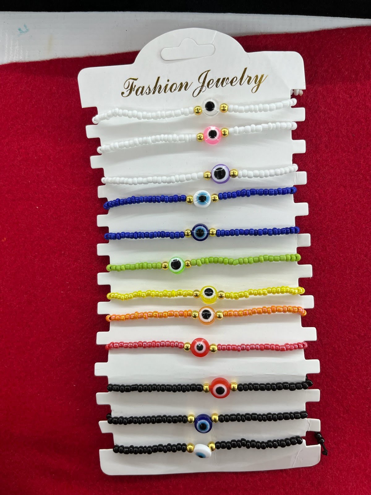 A display of different colors and sizes of bracelets.
