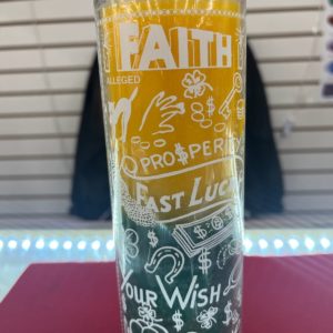 A glass with the words " faith, prosperity, fast luck ," and " our wish ".