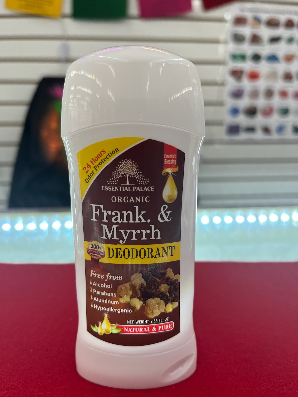 A bottle of deodorant sitting on top of a counter.