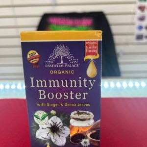 A box of organic immunity booster with ginger and fennel leaves.