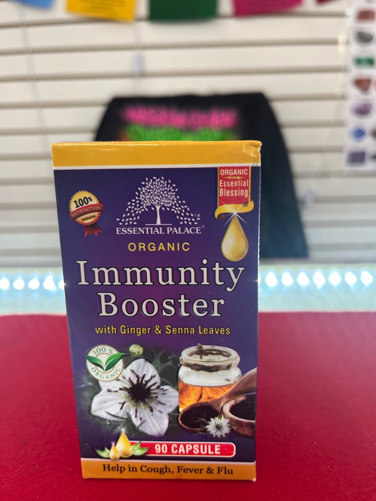 A box of organic immunity booster with ginger and fennel leaves.