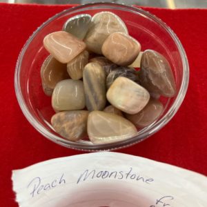 A bowl of rocks on top of a table.