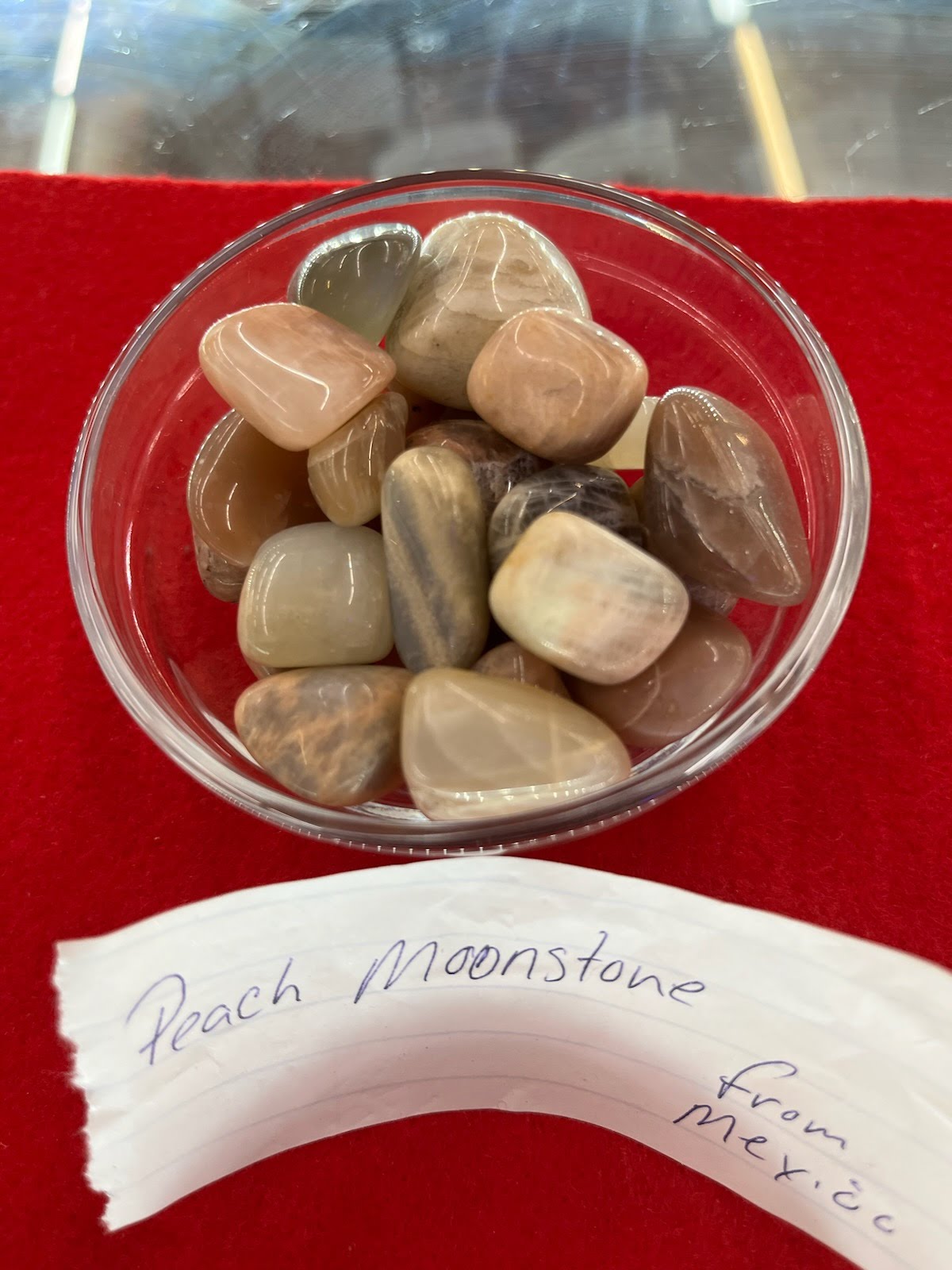 A bowl of rocks on top of a table.