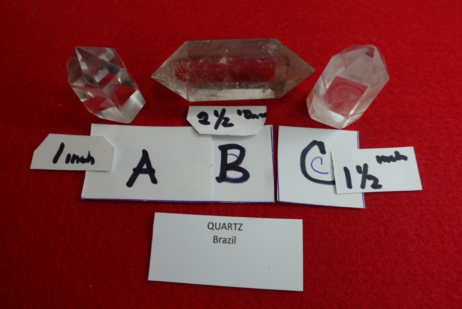 A red table with some sort of alphabet and numbers.