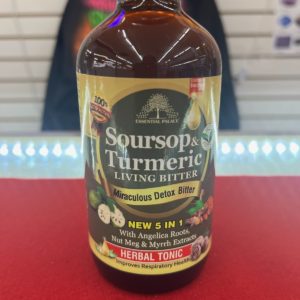 A bottle of turmeric sitting on top of a table.