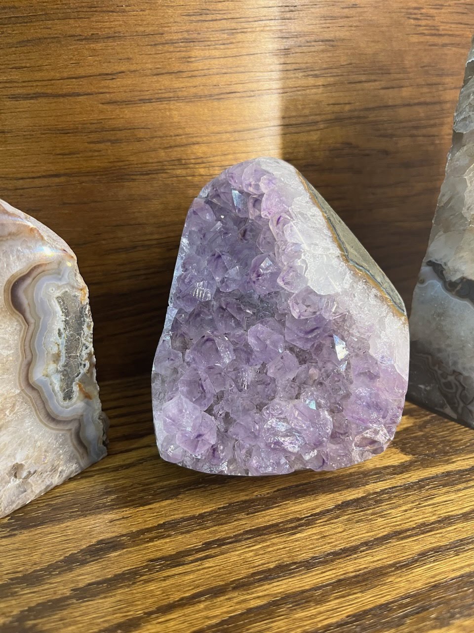 A close up of some rocks on top of a wooden table