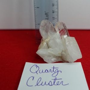 A white paper with the word " quartz cluster ".