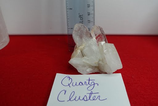 A white paper with the word " quartz cluster ".