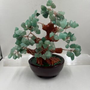 A bonsai tree made of green aventurine.